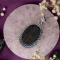 Black Tourmaline Pendant - Raw Natural Stone Oval Stone Silver Plated | Rooted in Stability